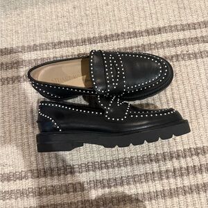 Stuart Weitzman Black Sole with Gold Accents